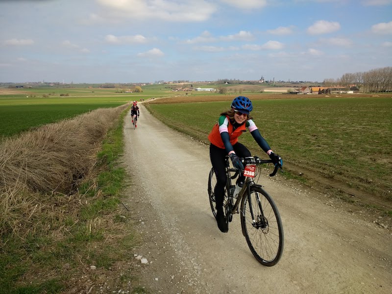 VC Walcot rider Claire Cottrell speeds through Flanders countryside on a gravel track